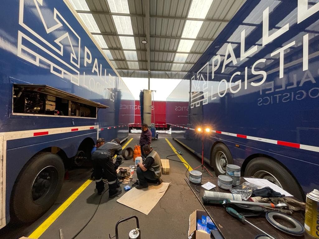 Trailer Logistics spare parts warehouse with racks identified by brand